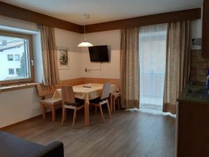 TV a/nebo společenská místnost v ubytování Residence Haus Peder