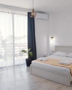 Letto o letti in una camera di Hotel General Tso Kobuleti