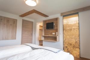 Posteľ alebo postele v izbe v ubytovaní Haus Sonnleitner