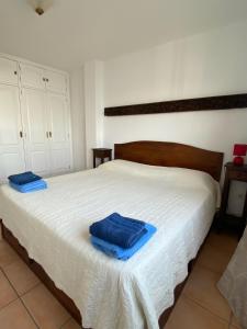 Postel nebo postele na pokoji v ubytování By The Sea Apartment Corralejo
