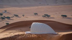 a tent in the middle of a desert at alsaif camp in Badīyah