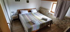 Postel nebo postele na pokoji v ubytování Eti and Mia holiday apartments