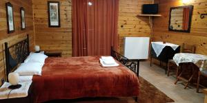 Posteľ alebo postele v izbe v ubytovaní Xylino Chalet