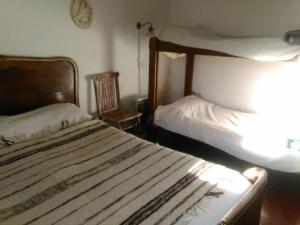 la Casa de Susana tesisinde bir odada yatak veya yataklar