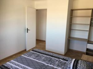 Łóżko lub łóżka w pokoju w obiekcie St Vélodrome 3 chambres parking 8 couchages neuf