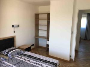 Łóżko lub łóżka w pokoju w obiekcie St Vélodrome 3 chambres parking 8 couchages neuf