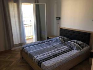 Łóżko lub łóżka w pokoju w obiekcie St Vélodrome 3 chambres parking 8 couchages neuf