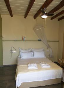 Postel nebo postele na pokoji v ubytování Agapi Holiday House