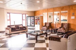 Posezení v ubytování Hotel Diego de Almagro Coyhaique