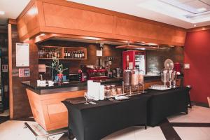 Lounge nebo bar v ubytování Hotel Diego de Almagro Coyhaique