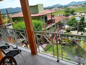 a view from the balcony of a house at A Casa Laranja in Florianópolis