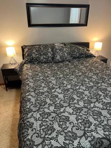 מיטה או מיטות בחדר ב-Poconos Vacation home