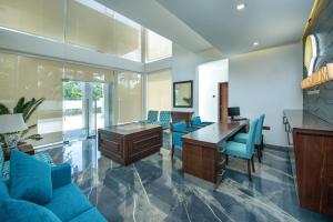 A seating area at Grand Samudra Hotel