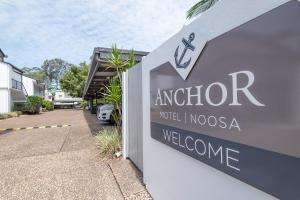 a sign for an interior hotel incolis a welcome sign at Anchor Motel Noosa in Noosaville