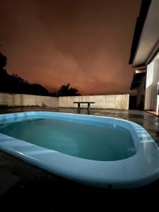 Piscine de l'établissement Casa virou negócio ou située à proximité