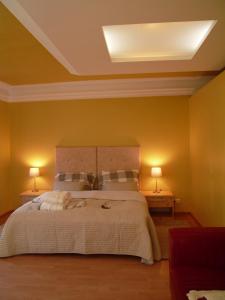 Posteľ alebo postele v izbe v ubytovaní Apartments and Suites Kremnica