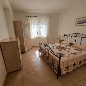 Кровать или кровати в номере Residence vista Sila
