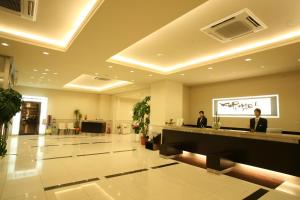 El vestíbulo o zona de recepción de Kurume Hotel Esprit