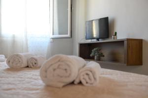 A bed or beds in a room at Ileana -Marina studio 2