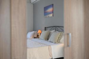A bed or beds in a room at Ileana -Marina studio 2