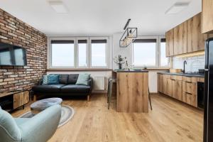 Kuchyňa alebo kuchynka v ubytovaní Stylish Kwiska Apartment Wrocław by Noclegi Renters