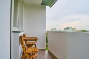 Balkón alebo terasa v ubytovaní Stylish Kwiska Apartment Wrocław by Noclegi Renters
