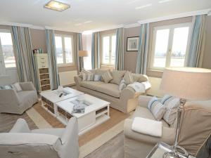 Posezení v ubytování Villa "Fernsicht" Sellin - Penthouse mit großer Dachterrasse