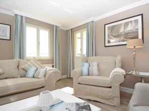 Posezení v ubytování Villa "Fernsicht" Sellin - Penthouse mit großer Dachterrasse