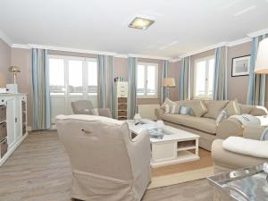 Posezení v ubytování Villa "Fernsicht" Sellin - Penthouse mit großer Dachterrasse