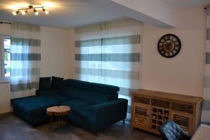 Area soggiorno di Happy Nest