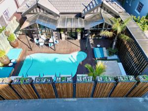 an aerial view of a house with a swimming pool at Mountview Guest House in Cape Town
