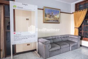 Posezení v ubytování Athaya Hotel Syariah near UGM Yogyakarta Mitra RedDoorz