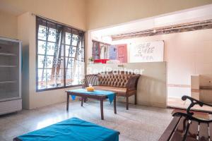 Posezení v ubytování Athaya Hotel Syariah near UGM Yogyakarta Mitra RedDoorz