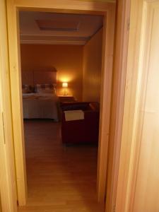 Posteľ alebo postele v izbe v ubytovaní Apartments and Suites Kremnica
