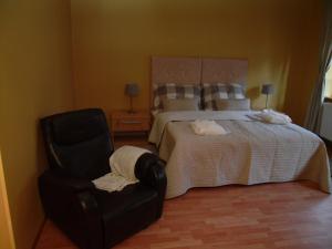 Posteľ alebo postele v izbe v ubytovaní Apartments and Suites Kremnica