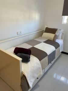 Ein Bett oder Betten in einem Zimmer der Unterkunft Pensión Coripe