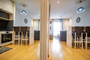 Cucina o angolo cottura di Apartman Oaza Kalman SPA-GYM