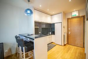 Cucina o angolo cottura di Apartman Oaza Kalman SPA-GYM