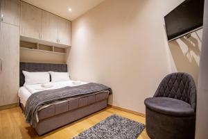 Letto o letti in una camera di Apartman Oaza Kalman SPA-GYM