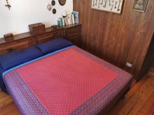 A bed or beds in a room at Cogne come una volta