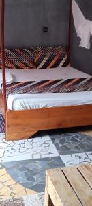 Postel nebo postele na pokoji v ubytování Akwa Guesthouse Cotonou