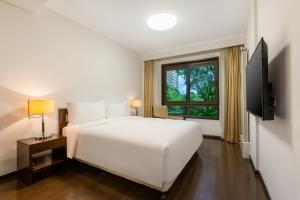 TV a/nebo společenská místnost v ubytování Belgravia Serviced Residence Wuxi