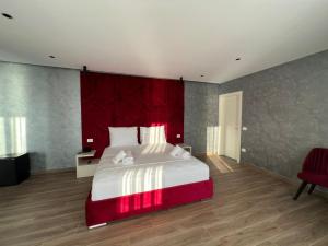 Letto o letti in una camera di Hotel LEON - Beach Front