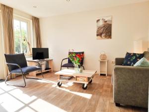 Χώρος καθιστικού στο Rustig gelegen Vakantiehuis AK10