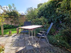 Κήπος έξω από το Rustig gelegen Vakantiehuis AK10