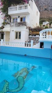 The swimming pool at or close to Entire Villa full View 3 bedrooms 3 bathrooms 3 kitchens