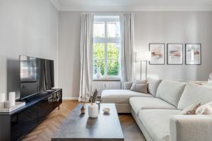 Μια τηλεόραση ή/και κέντρο ψυχαγωγίας στο Apartment Villa Anna - Die Beletage