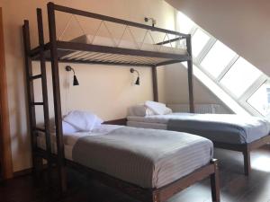 Кровать или кровати в номере Rock'n'hostel