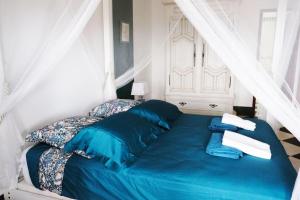 Postel nebo postele na pokoji v ubytování Villa Beauregard