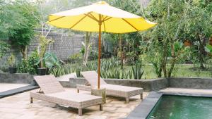 Ein Garten an der Unterkunft Lullabi Lumbung Villa